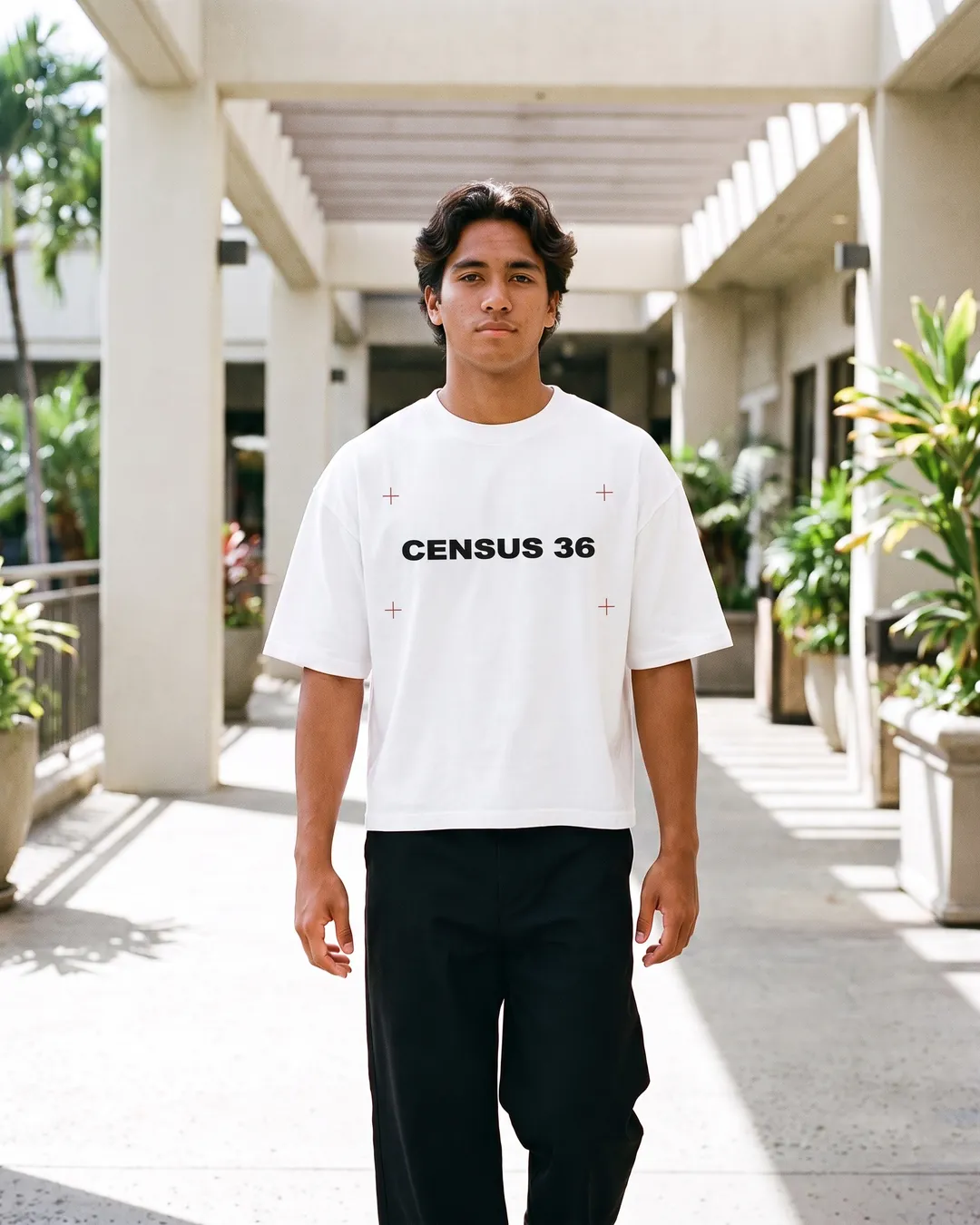 C36-002 white tee worn at Ala Moana: CENSUS 36 wordmark centred on the chest